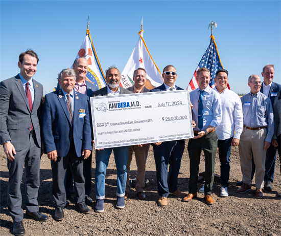 I presented the Capital SouthEast Connector JPA with a $25,000,000 check to support this project.