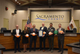 Rep. Bera poses for photo with Sacramento County Supervisors 