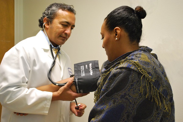 Dr. Bera check blood pressure