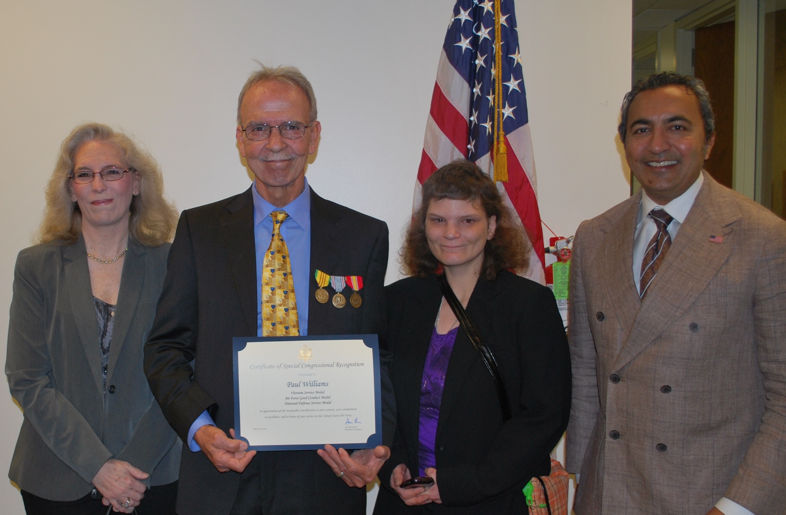 Mr. Williams and family with Rep. Bera